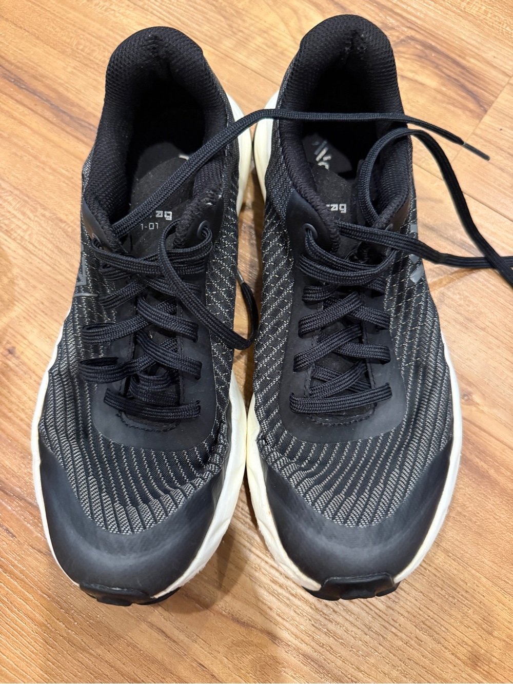 Women's Black Athletic Running Shoes with Cushioned White Midsole